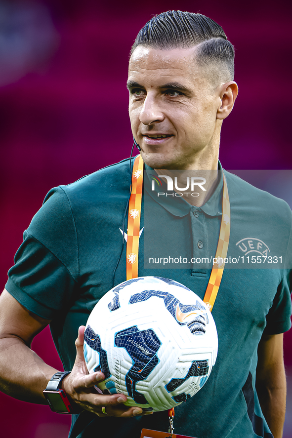 Referee Donatas Rumsas officiates the match between the Netherlands and Bosnia and Herzegovina at the Philips Stadium for the UEFA Nations L...