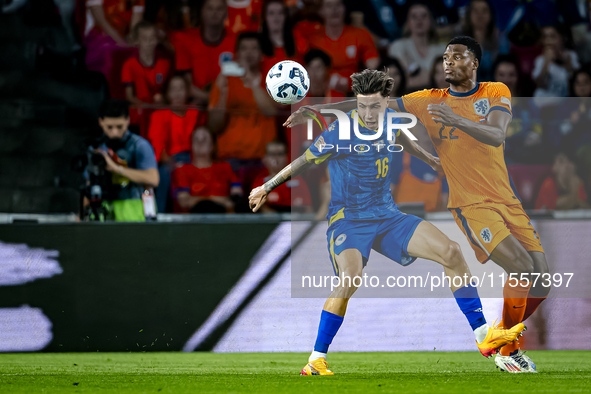 Bosnia and Herzegovina midfielder Denis Huseinbasic and Netherlands defender Denzel Dumfries during the match between the Netherlands and Bo...