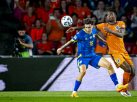 Bosnia and Herzegovina midfielder Denis Huseinbasic and Netherlands defender Denzel Dumfries during the match between the Netherlands and Bo...