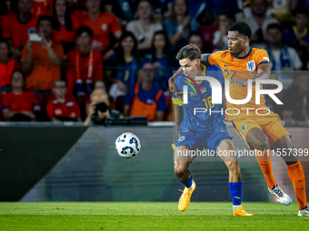 Bosnia and Herzegovina midfielder Denis Huseinbasic and Netherlands defender Denzel Dumfries during the match between the Netherlands and Bo...