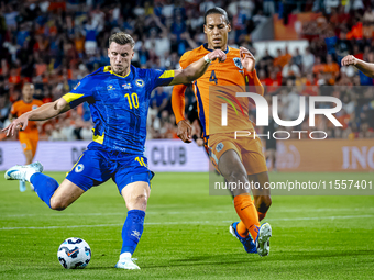 Bosnia and Herzegovina forward Ermedin Demirovic and Netherlands defender Virgil van Dijk during the match between the Netherlands and Bosni...