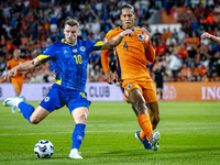 Bosnia and Herzegovina forward Ermedin Demirovic and Netherlands defender Virgil van Dijk during the match between the Netherlands and Bosni...