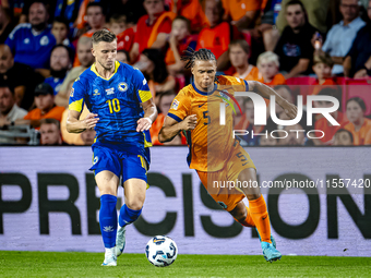 Bosnia and Herzegovina forward Ermedin Demirovic and Netherlands defender Nathan Ake during the match between the Netherlands and Bosnia and...