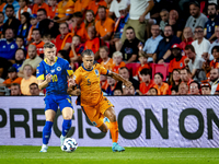 Bosnia and Herzegovina forward Ermedin Demirovic and Netherlands defender Nathan Ake during the match between the Netherlands and Bosnia and...