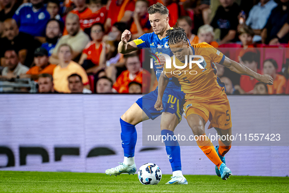 Bosnia and Herzegovina forward Ermedin Demirovic and Netherlands defender Nathan Ake during the match between the Netherlands and Bosnia and...