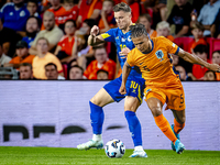 Bosnia and Herzegovina forward Ermedin Demirovic and Netherlands defender Nathan Ake during the match between the Netherlands and Bosnia and...