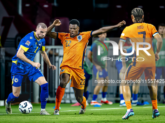 Bosnia and Herzegovina defender Nihad Mujakic and Netherlands defender Denzel Dumfries during the match between the Netherlands and Bosnia a...