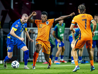 Bosnia and Herzegovina defender Nihad Mujakic and Netherlands defender Denzel Dumfries during the match between the Netherlands and Bosnia a...