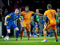 Bosnia and Herzegovina defender Nihad Mujakic and Netherlands defender Denzel Dumfries during the match between the Netherlands and Bosnia a...