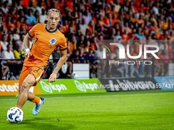 Netherlands midfielder Xavi Simons plays during the match between the Netherlands and Bosnia and Herzegovina at the Philips Stadium for the...