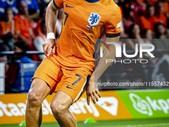 Netherlands midfielder Xavi Simons plays during the match between the Netherlands and Bosnia and Herzegovina at the Philips Stadium for the...