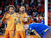 Netherlands forward Cody Gakpo scores the 3-1 goal and celebrates during the match between the Netherlands and Bosnia and Herzegovina at the...