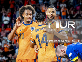 Netherlands forward Cody Gakpo scores the 3-1 goal and celebrates during the match between the Netherlands and Bosnia and Herzegovina at the...