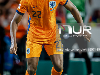 Netherlands defender Denzel Dumfries plays during the match between the Netherlands and Bosnia and Herzegovina at the Philips Stadium for th...