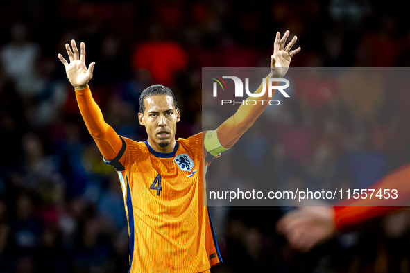 Netherlands defender Virgil van Dijk plays during the match between the Netherlands and Bosnia and Herzegovina at the Philips Stadium for th...