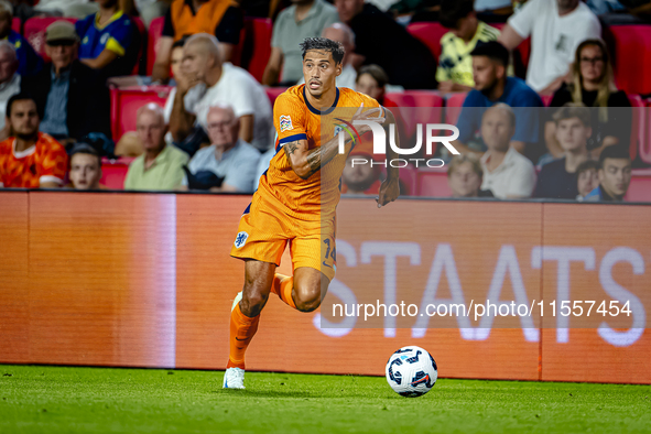 Netherlands midfielder Tijani Reijnders plays during the match between the Netherlands and Bosnia and Herzegovina at the Philips Stadium for...