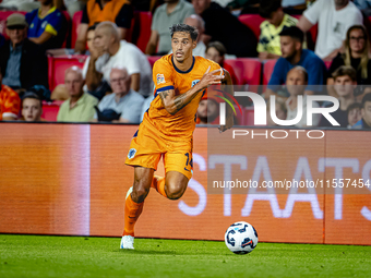 Netherlands midfielder Tijani Reijnders plays during the match between the Netherlands and Bosnia and Herzegovina at the Philips Stadium for...