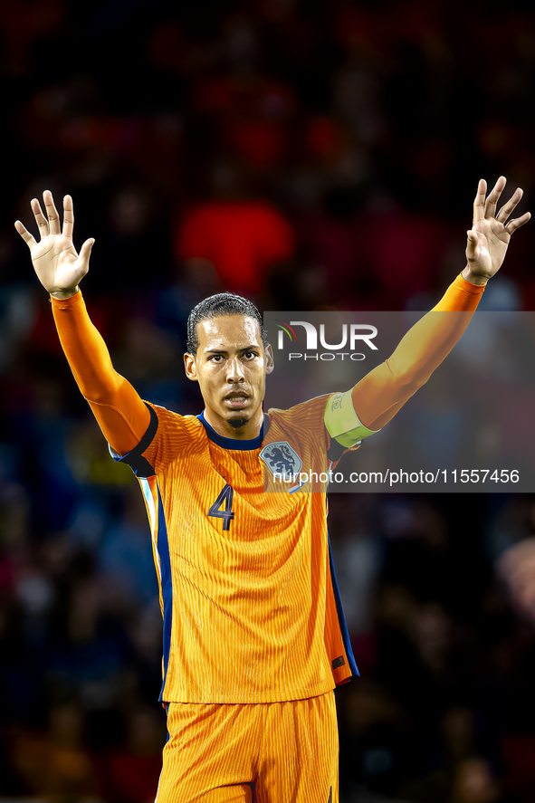 Netherlands defender Virgil van Dijk plays during the match between the Netherlands and Bosnia and Herzegovina at the Philips Stadium for th...