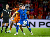 Netherlands forward Joshua Zirkzee and Bosnia and Herzegovina defender Nihad Mujakic during the match between the Netherlands and Bosnia and...