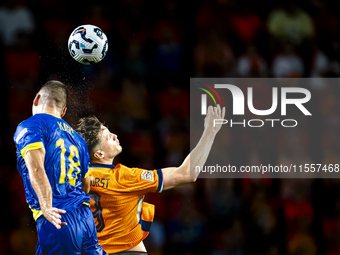 Bosnia and Herzegovina defender Nikola Katic and Netherlands forward Wout Weghorst during the match between the Netherlands and Bosnia and H...