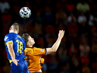 Bosnia and Herzegovina defender Nikola Katic and Netherlands forward Wout Weghorst during the match between the Netherlands and Bosnia and H...