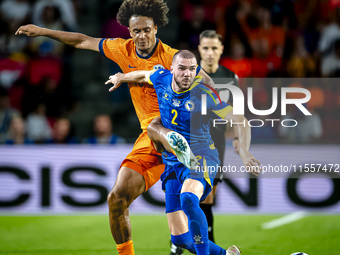 Netherlands forward Joshua Zirkzee and Bosnia and Herzegovina defender Nihad Mujakic during the match between the Netherlands and Bosnia and...