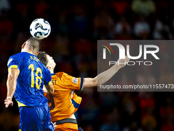 Bosnia and Herzegovina defender Nikola Katic and Netherlands forward Wout Weghorst during the match between the Netherlands and Bosnia and H...