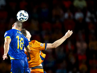 Bosnia and Herzegovina defender Nikola Katic and Netherlands forward Wout Weghorst during the match between the Netherlands and Bosnia and H...