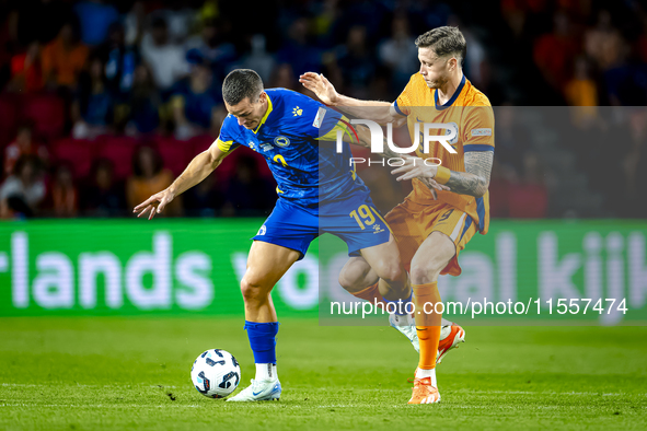 Bosnia and Herzegovina defender Dario Saric and Netherlands forward Wout Weghorst during the match between the Netherlands and Bosnia and He...