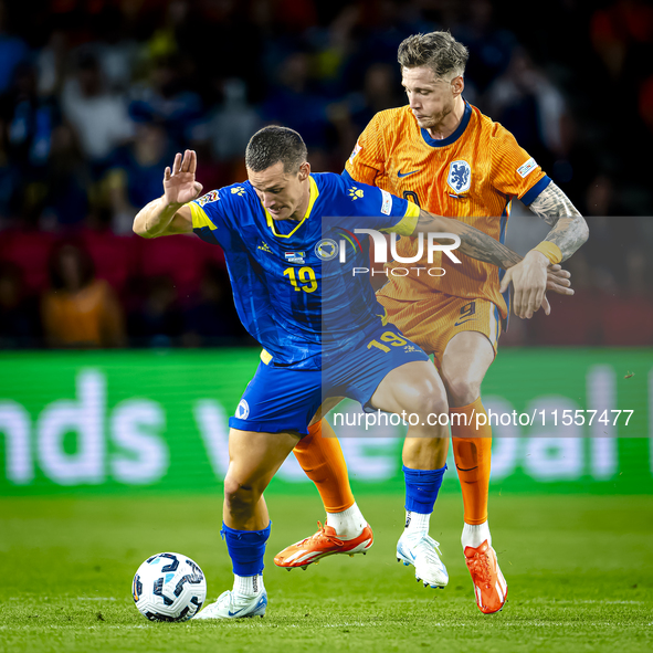 Bosnia and Herzegovina defender Dario Saric and Netherlands forward Wout Weghorst during the match between the Netherlands and Bosnia and He...