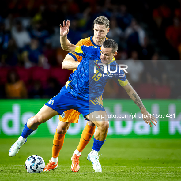 Bosnia and Herzegovina defender Dario Saric and Netherlands forward Wout Weghorst during the match between the Netherlands and Bosnia and He...