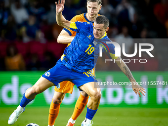 Bosnia and Herzegovina defender Dario Saric and Netherlands forward Wout Weghorst during the match between the Netherlands and Bosnia and He...