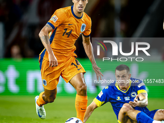 Netherlands midfielder Tijani Reijnders plays during the match between the Netherlands and Bosnia and Herzegovina at the Philips Stadium for...