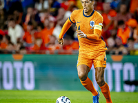 Netherlands defender Virgil van Dijk plays during the match between the Netherlands and Bosnia and Herzegovina at the Philips Stadium for th...