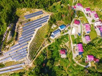 Photovoltaic panels are installed on a barren mountain in Anqing, China, on September 8, 2024. (