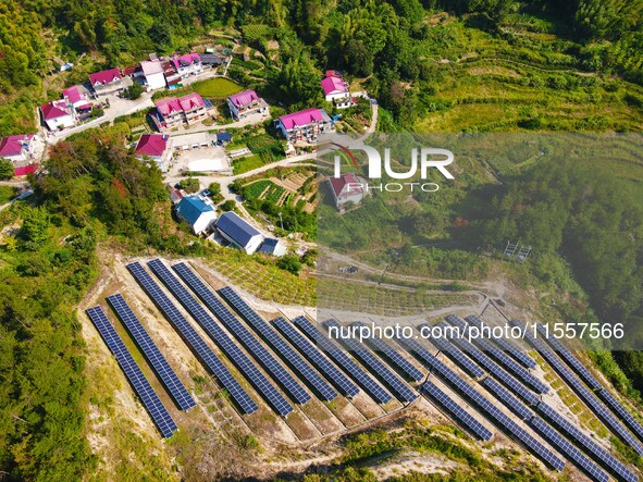 Photovoltaic panels are installed on a barren mountain in Anqing, China, on September 8, 2024. 