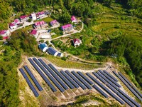 Photovoltaic panels are installed on a barren mountain in Anqing, China, on September 8, 2024. (