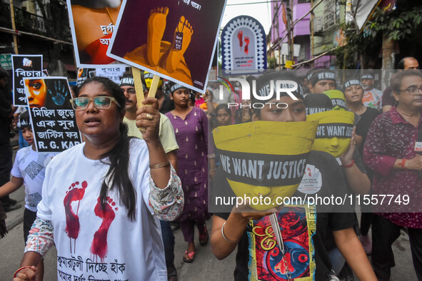 Artisans of Durga Puja and common citizens participate in a protest rally in Kolkata, India, on September 8, 2024, demanding justice for the...