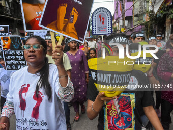 Artisans of Durga Puja and common citizens participate in a protest rally in Kolkata, India, on September 8, 2024, demanding justice for the...