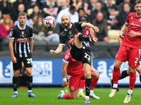 Curtis Edwards of Notts County plays the ball forward during the Sky Bet League 2 match between Notts County and Accrington Stanley at Meado...