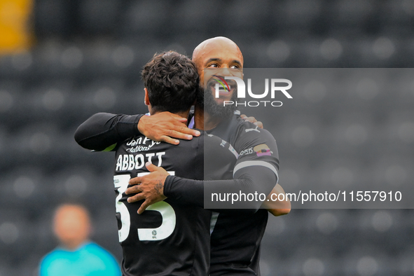 David McGoldrick of Notts County celebrates with George Abbott of Notts County after scoring a goal to make it 1-0 during the Sky Bet League...