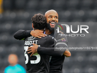 David McGoldrick of Notts County celebrates with George Abbott of Notts County after scoring a goal to make it 1-0 during the Sky Bet League...