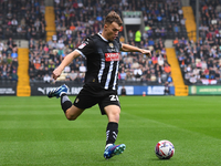 Lewis Macari of Notts County lines up a cross during the Sky Bet League 2 match between Notts County and Accrington Stanley at Meadow Lane i...