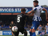 Gary Nadine of Hartlepool United challenges for a header with Adam Senior of FC Halifax Town during the Vanarama National League match betwe...