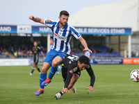 Nathan Sheron of Hartlepool United challenges Angelo Capello of FC Halifax Town during the Vanarama National League match between Hartlepool...