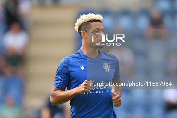 Lyle Taylor (33 Colchester United) warms up during the Sky Bet League 2 match between Colchester United and Bromley at the Weston Homes Comm...