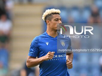 Lyle Taylor (33 Colchester United) warms up during the Sky Bet League 2 match between Colchester United and Bromley at the Weston Homes Comm...