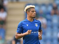 Lyle Taylor (33 Colchester United) warms up during the Sky Bet League 2 match between Colchester United and Bromley at the Weston Homes Comm...