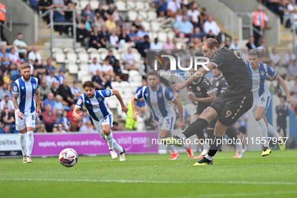 Michael Cheek (9 Bromley) scores from the penalty spot to make it 0-1 during the Sky Bet League 2 match between Colchester United and Bromle...