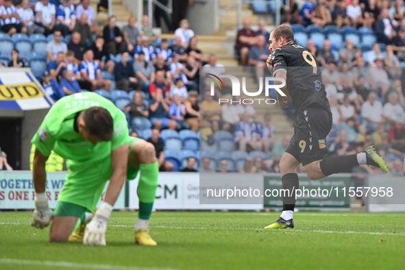 Michael Cheek (9 Bromley) celebrates after scoring the team's first goal from the penalty spot during the Sky Bet League 2 match between Col...